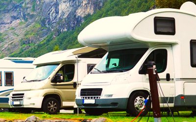 Motorhomes ready for hire beside the mountains