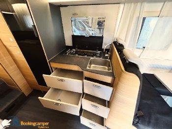 F 13Adria Coral XLPlus660SL Mansardato Con Letti Gemelli Per5Persone Noleggio Cassettoni Cucin(1)